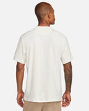 DRI-FIT PRIMARY VERSATILE TOP BEIGE
