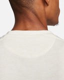 DRI-FIT PRIMARY VERSATILE TOP BEIGE